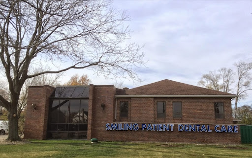 Smiling Patient Dental Care Logo