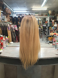 Photo n°11 de Afro Magh Euro coiffure à Roubaix (Magasin de perruques)