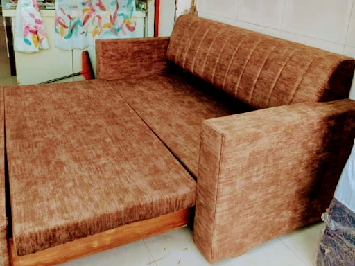Wooden sofa cumbed post image