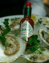 Oyster Served on Crushed Ice with Lemon