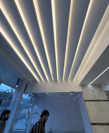 Premium Commercial Gypsum False Ceiling with Modern Linear Cove Lighting ✨ post image