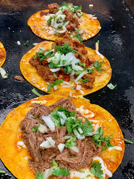 UNOS TACOS Y BIRRIA by null