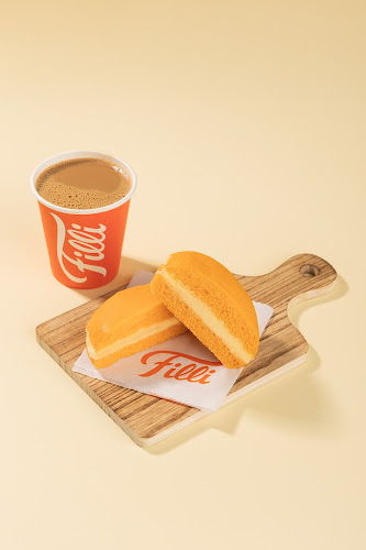 Filli Cafe | Airport road - Abu Dhabi Contact