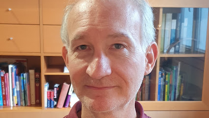 Dr Bertrand Delas