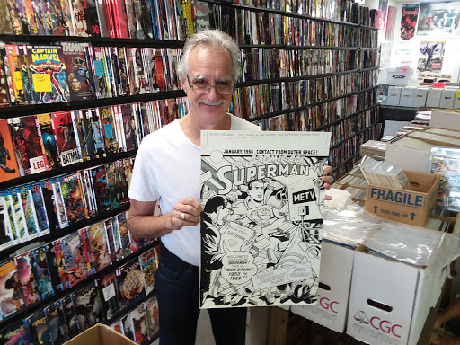 PHIL'S COMIC SHOPPE - Visual
