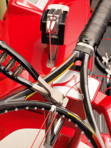 CET Stringer Racquet Stringing & Customizing