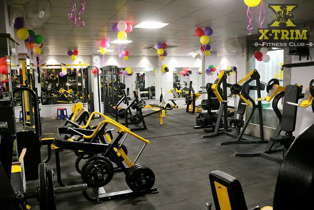 X Trim Fitness Club