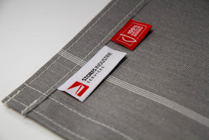 Photo n°28 de Stores Industrie Services à Borgo (Atelier de couture)