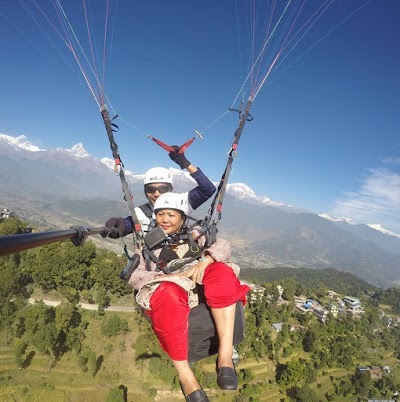 Photos of mountain hawk paragliding