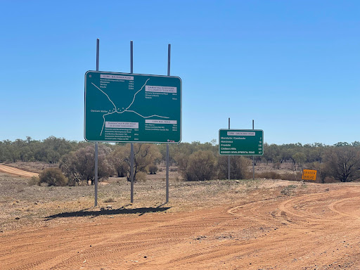 Diamantina River Rd & Cork Macunda Rd Intersection Logo