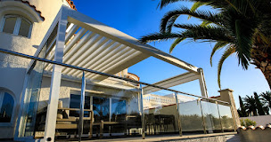 Photo n°8 de Komilfo Fermetures Service à Angers - Pergolas, Stores, Fenêtres, Menuiseries à Beaucouzé (Magasin de stores et de rideaux)