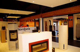 Photo n°9 de Aäsgard Laval - Poêle à bois - Poêle à granulés - Poêle de masse à Saint-Berthevin (Magasin de poêles à bois)