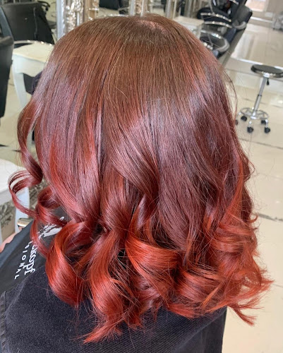 Enigma Hair & Beauty Phone number