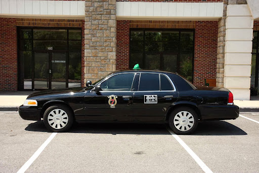 Roswell Taxi Logo