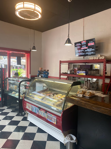 Grinds Vines and Automobilia Cafe Inc - Thumbnail