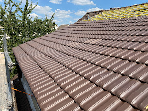 Photo n°3 de Artisan FOLKERT - Couvreur 92 Chatillon à Châtillon (Couvreur)