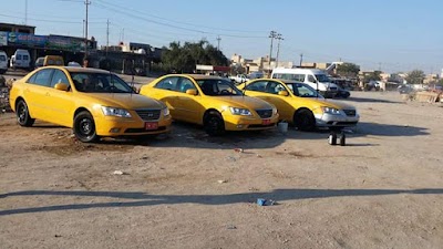 Photos of Mr. Shaker Mayali station to switch oils and filters