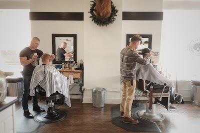 C. Wolf Barber & Shop