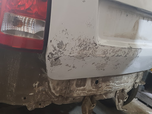 Denting rear side and bumper