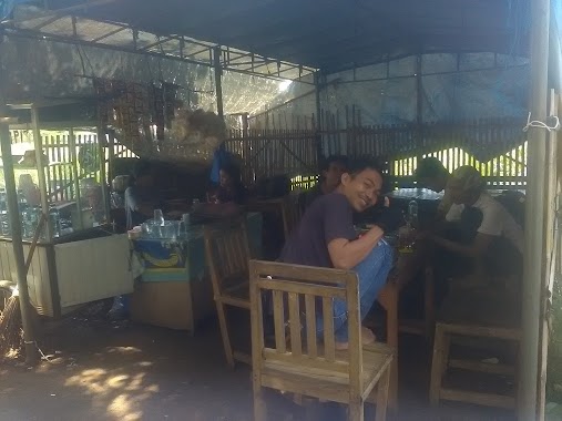 Warung Kopi Naga, Author: Samwani Bogi