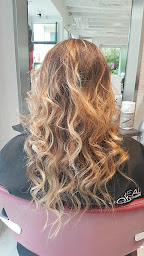 Photo n°4 de Univ'hair à Villebarou (Magasin de produits de beauté)