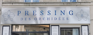 Photo n°5 de Pressing Des Orchidées à Piégut-Pluviers (Blanchisserie)