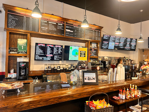 Grinds Vines and Automobilia Cafe Inc - Thumbnail