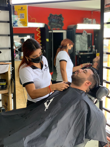 El muñeco barber shop