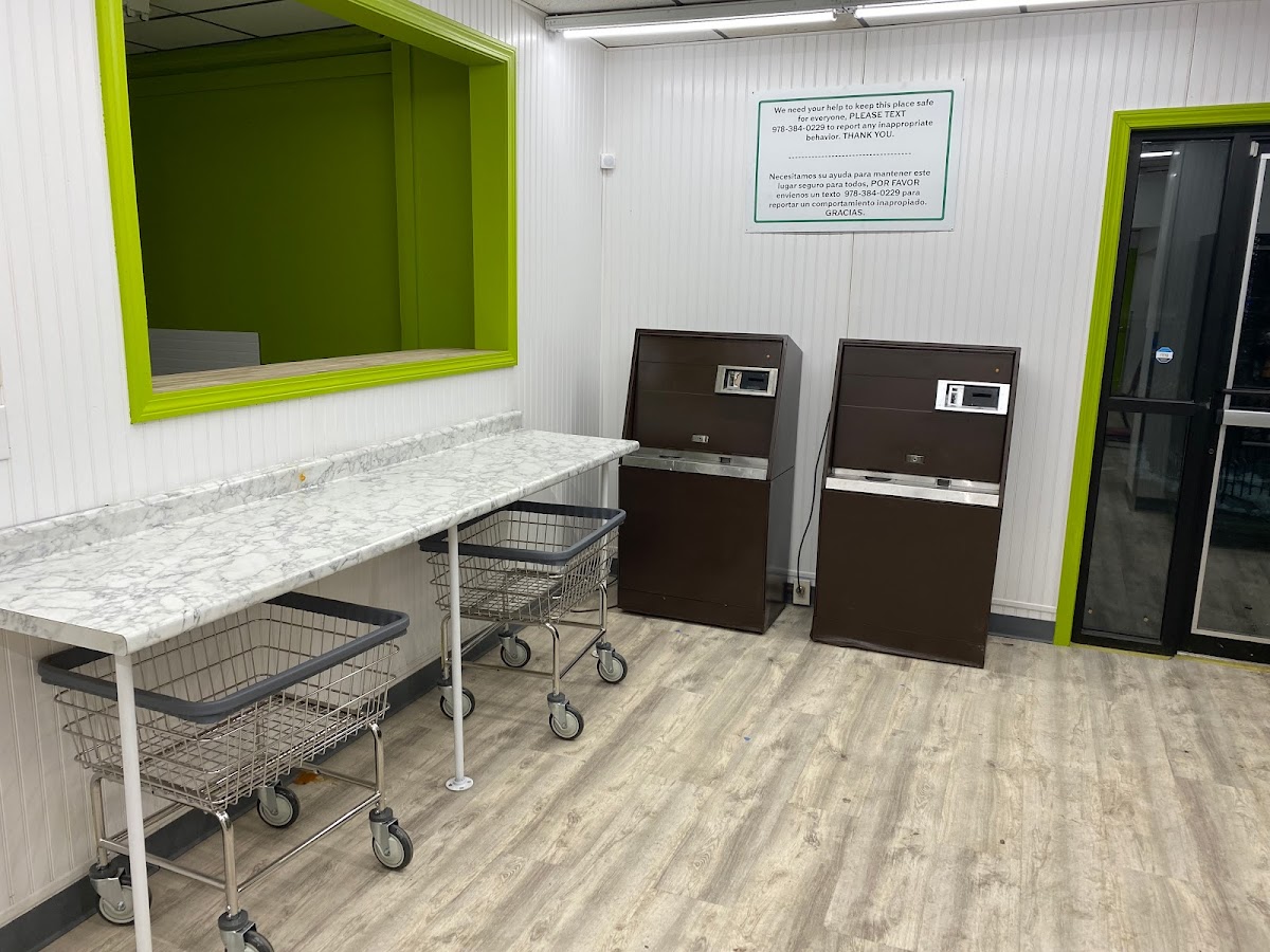 Clean laundry equipment at Laundry Lake Laundromat in Manchester, NH