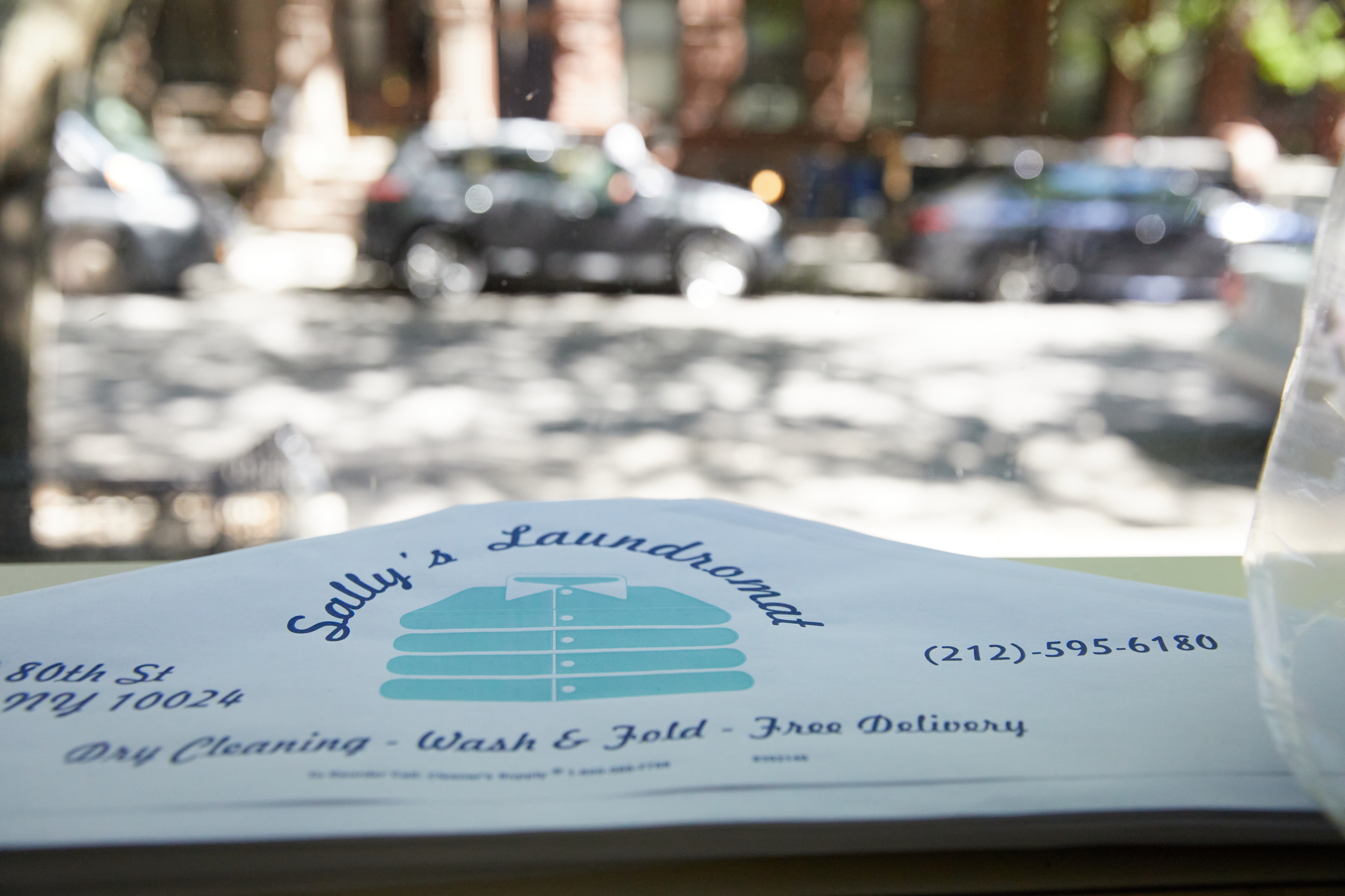 Sally's Laundromat facility with washing machines in New York