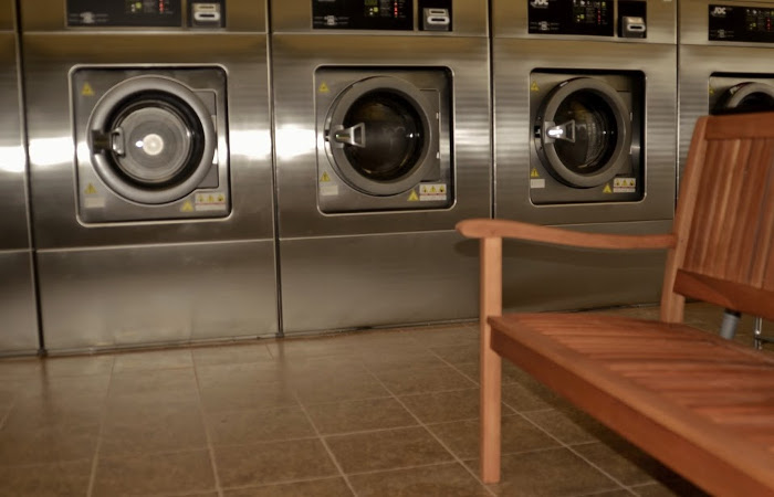 Neptune Laundromat facility with washing machines in Malden