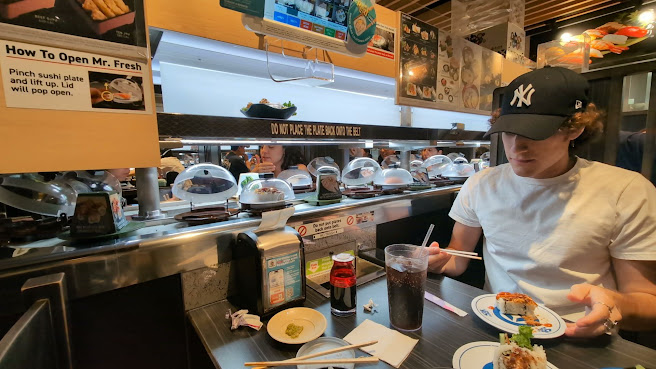 Kura Revolving Sushi Bar by null