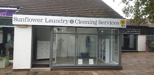 Sunflower Laundry & Cleaning Services Logo