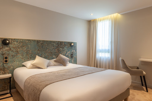Photo de Logis Hôtel l'Éolienne à Rouxmesnil-Bouteilles (76370)