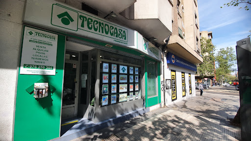 Tecnocasa agencia inmobiliaria Logo