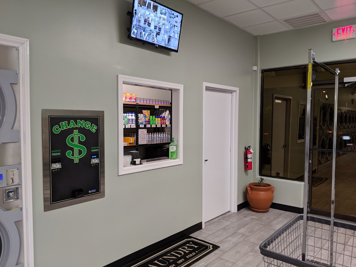 Clean laundry equipment at Wash & Dry Laundromat in Tucson, AZ