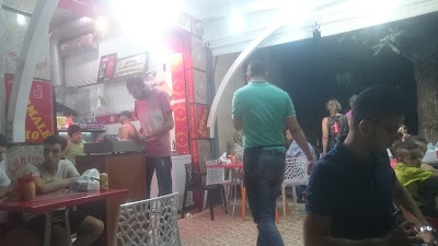 Photos of Mounir AL Akhawain