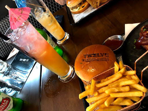 Twelve Brunch & Cocktails Logo