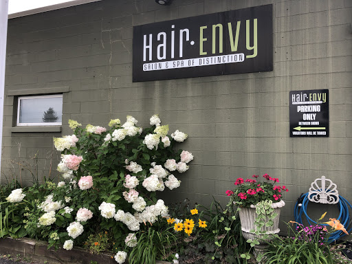 Hair Envy Salon and Spa of Distinction Logo