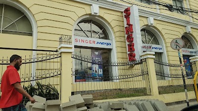 Photos of Singer Mega