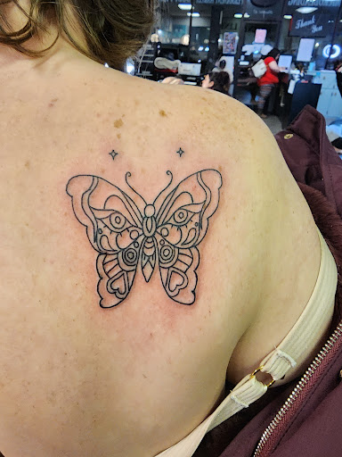 Divine Lines Body Art Studio Logo