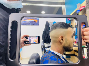 Photo n°15 de GN13 COIFFURE à Paris (Salon de coiffure)