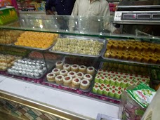 Umar Farooq Sweets Bakers And Resturant City Plaza Multan Road khanewal