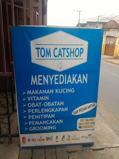 Photos of TOM CATSHOP