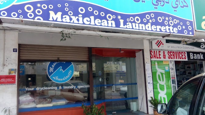 Maxiclean Launderette, Author: Musa Manggai