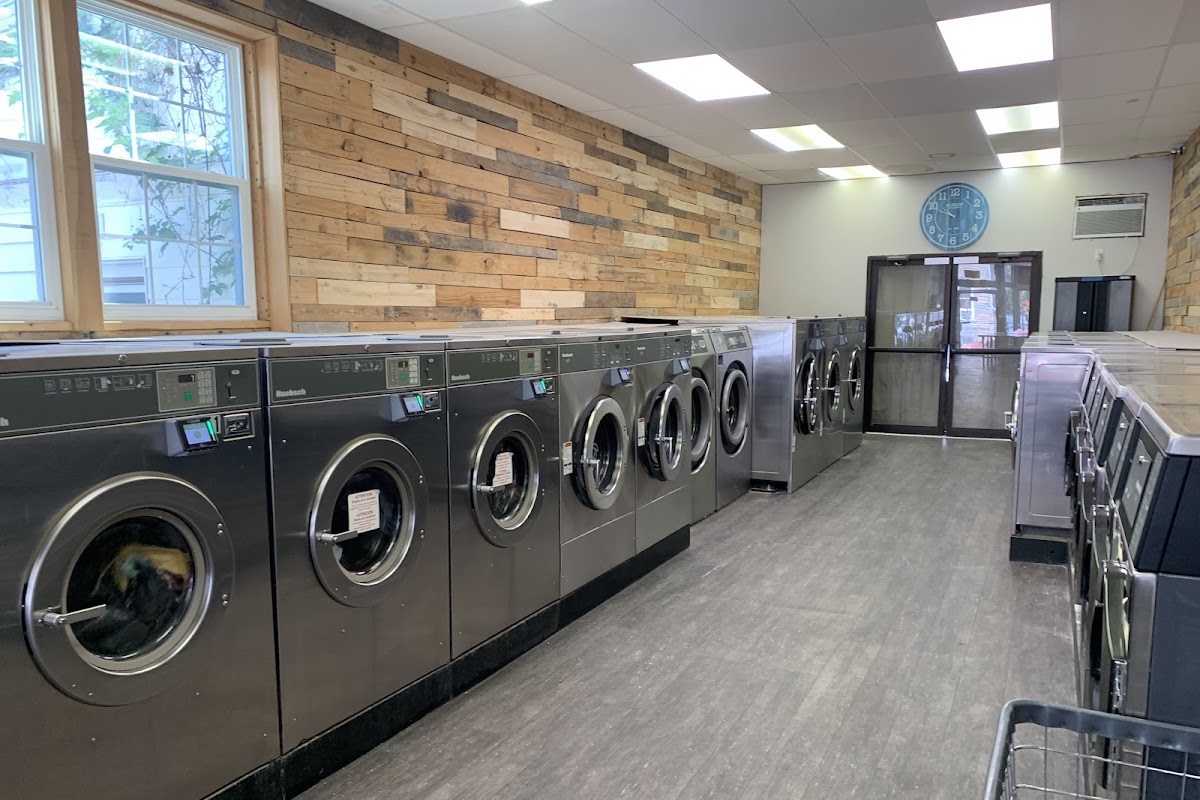 Clean laundry equipment at Spring Street Laundromat in Reading, PA