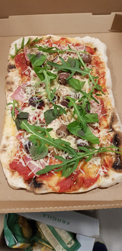 Photo 3 - La rôtisserie italienne. Poulets fermiers cuits à la broche. Pizza à la Romana