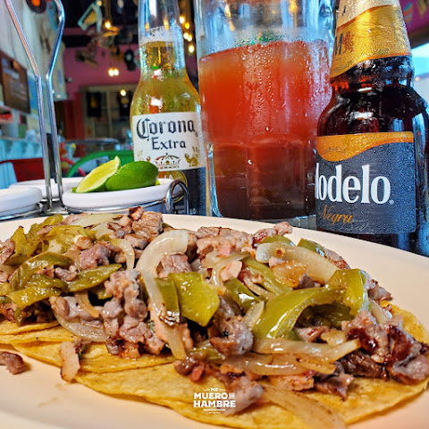 Me Muero de Hambre by null