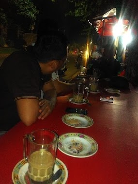 Uli Bakar N Wedang Jahe Pak uban, Author: Tatang Ridho