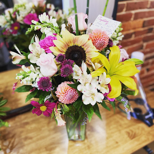Holmes Greenhouse & Florist Shop Logo